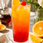 Easy Citrus Sunrise Mocktail with orange and lemon